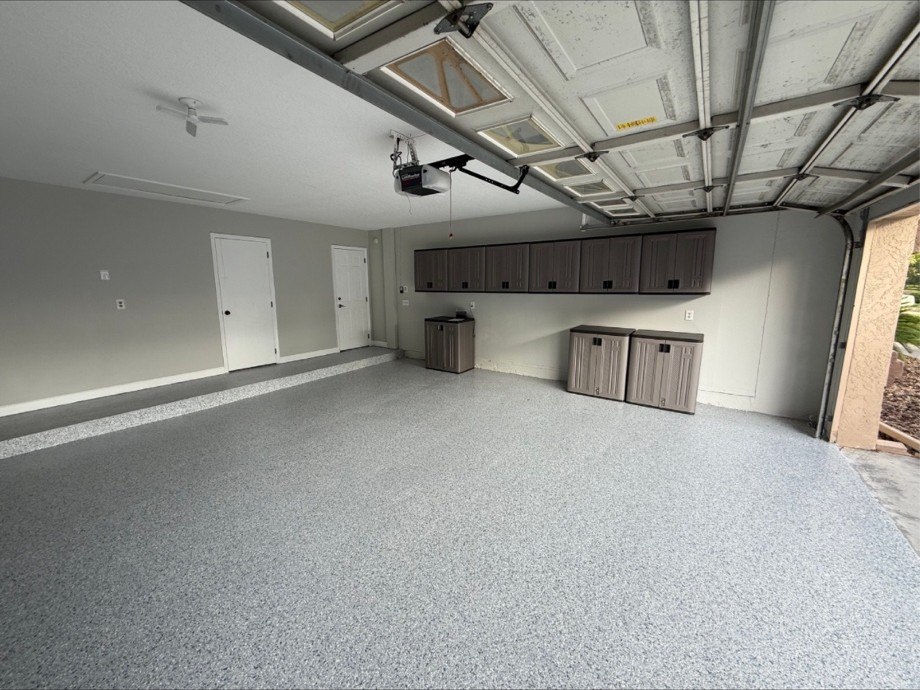 Drifting Sands garage remodel by C&A Contracting with epoxy flake floor and custom cabinetry in Tampa Bay